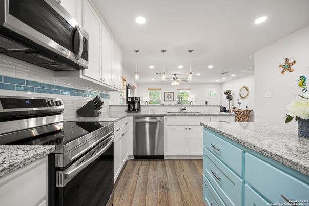 Interior, Kitchen, Pendant Lights, Recessed Lighting, Stainless Steel Appliances, Wood Texture Flooring