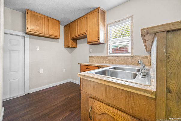 Interior, Kitchen, Tile Countertops, Wood Texture Flooring