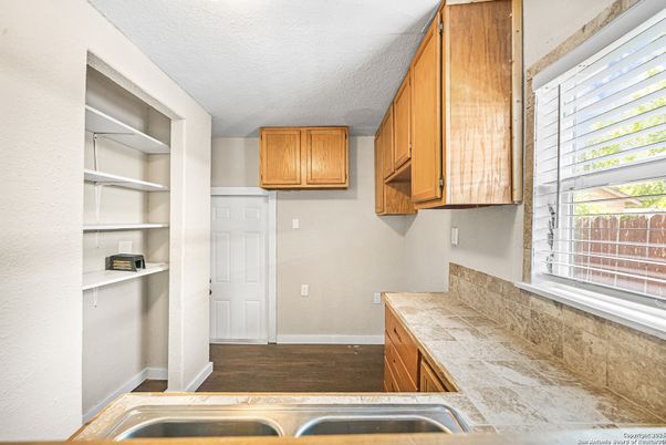 Interior, Kitchen, Tile Countertops, Wood Texture Flooring