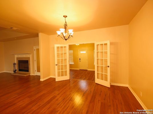 Chandelier, Empty room, Fireplace, Interior, Wood Texture Flooring