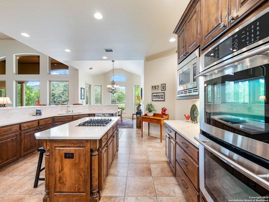 Chandelier, Dining room, Interior, Kitchen, Recessed Lighting, Stainless Steel Appliances