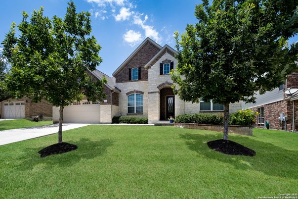 Attached, Backyard, Exterior, Facade, Brick Facade, Brick Traditional