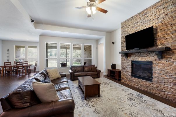 Dining room, Fireplace, Interior, Living room, Recessed Lighting, Stone Walls
