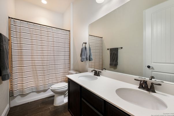 Bathroom, Dual Sink Vanities, Interior, Recessed Lighting, Wood Texture Flooring