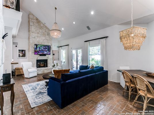 Chandelier, Dining room, Fireplace, Interior, Living room, Pendant Lights, Recessed Lighting, Stone Walls