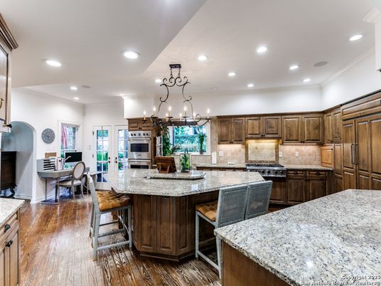 Chandelier, Dining room, Interior, Kitchen, Recessed Lighting, Stainless Steel Appliances, Wood Texture Flooring