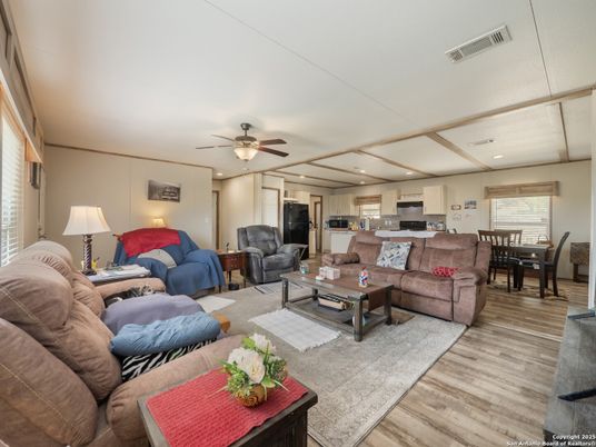 Dining room, Interior, Kitchen, Living room, Recessed Lighting, Stainless Steel Appliances, Wood Texture Flooring