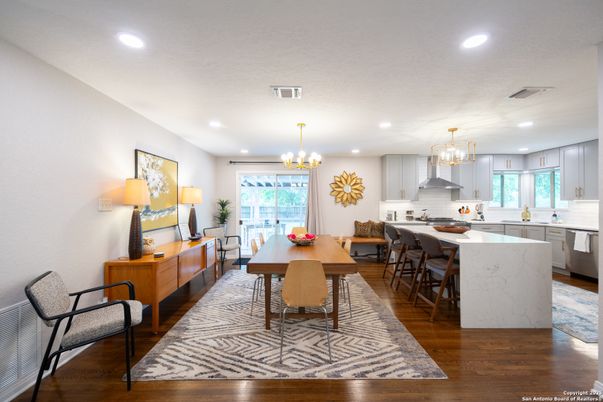 Chandelier, Dining room, Interior, Kitchen, Recessed Lighting, Stainless Steel Appliances, Wood Texture Flooring