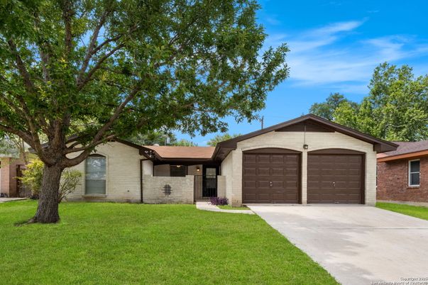 Attached, Backyard, Exterior, Facade, Brick Facade, Ranch