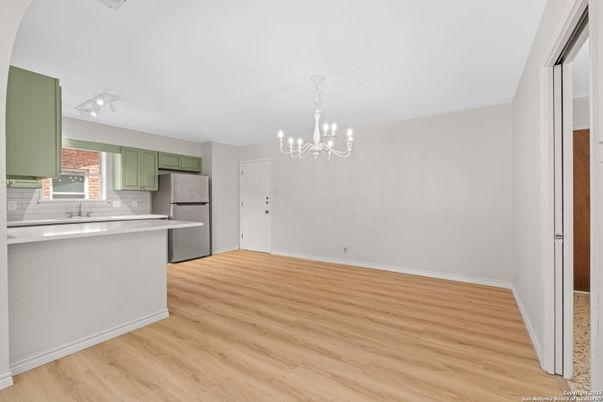 Chandelier, Empty room, Interior, Kitchen, Stainless Steel Appliances, Wood Texture Flooring