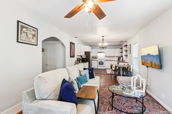 Chandelier, Dining room, Interior, Kitchen, Living room, Stainless Steel Appliances, Wood Texture Flooring