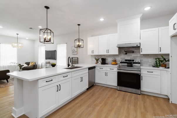 Interior, Kitchen, Pendant Lights, Recessed Lighting, Stainless Steel Appliances, Wood Texture Flooring