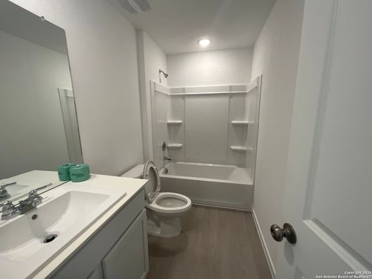 Bathroom, Dual Sink Vanities, Interior, Recessed Lighting, Wood Texture Flooring