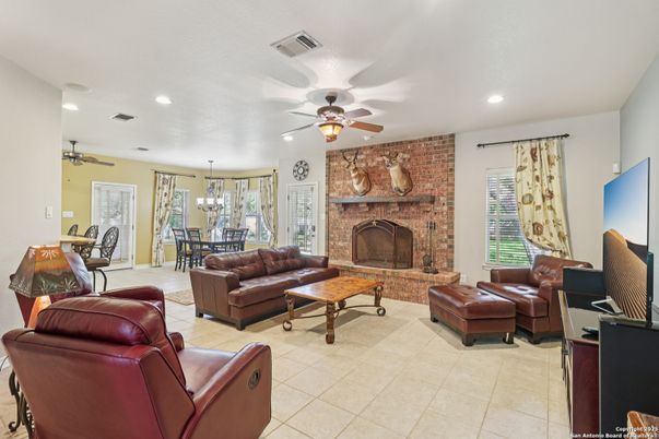 Dining room, Fireplace, Interior, Living room, Pendant Lights, Recessed Lighting, Stone Walls
