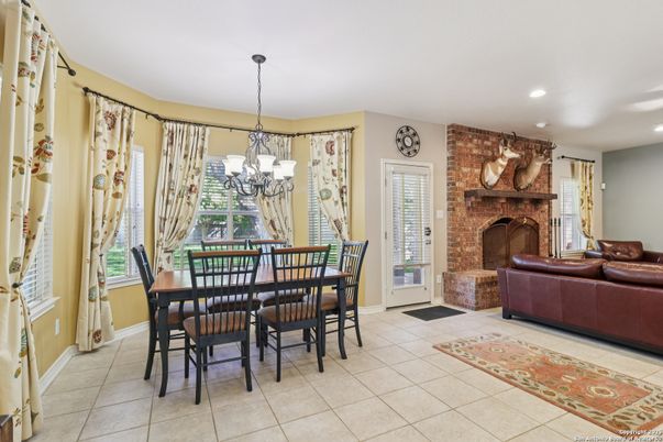 Chandelier, Dining room, Fireplace, Interior, Living room, Recessed Lighting, Stone Walls