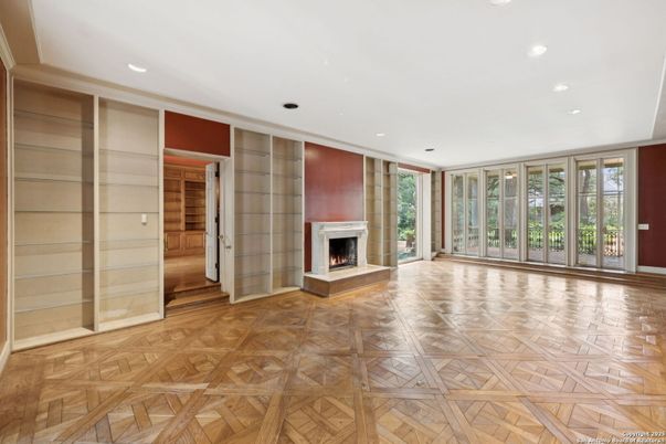 Empty room, Fireplace, Interior, Recessed Lighting, Wood Texture Flooring, Wooden Walls