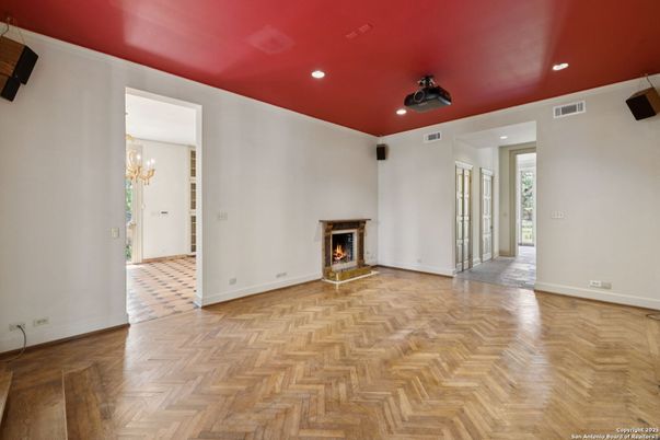 Chandelier, Empty room, Fireplace, Interior, Recessed Lighting, Wood Texture Flooring