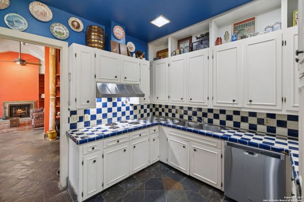 Fireplace, Interior, Kitchen, Recessed Lighting, Tile Countertops
