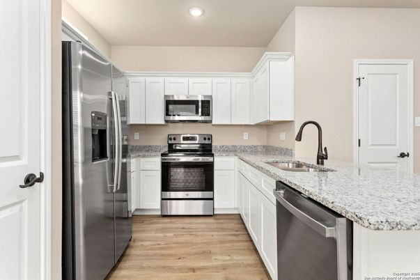 Interior, Kitchen, Recessed Lighting, Stainless Steel Appliances, Wood Texture Flooring