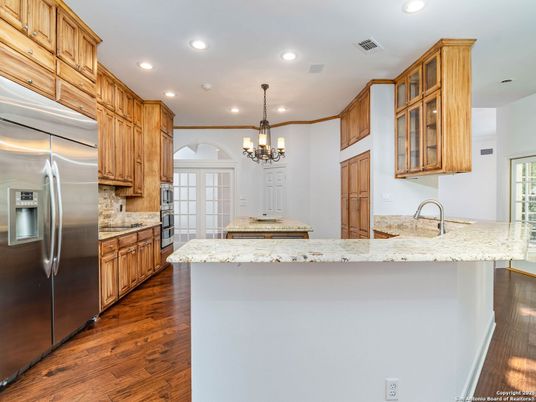 Chandelier, Interior, Kitchen, Recessed Lighting, Stainless Steel Appliances, Wood Texture Flooring