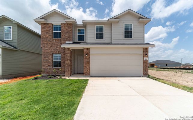Attached, Exterior, Facade, Brick Facade, Brick Traditional