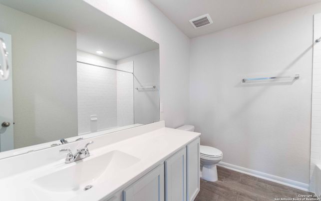 Bathroom, Dual Sink Vanities, Interior, Recessed Lighting, Wood Texture Flooring