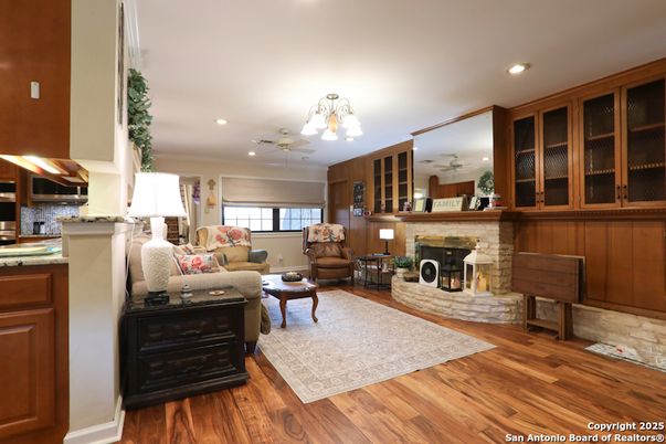 Fireplace, Interior, Living room, Recessed Lighting, Wood Texture Flooring