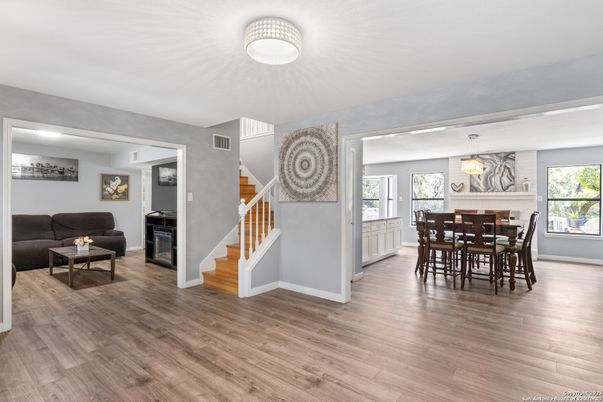 Dining room, Fireplace, Interior, Pendant Lights, Wood Texture Flooring