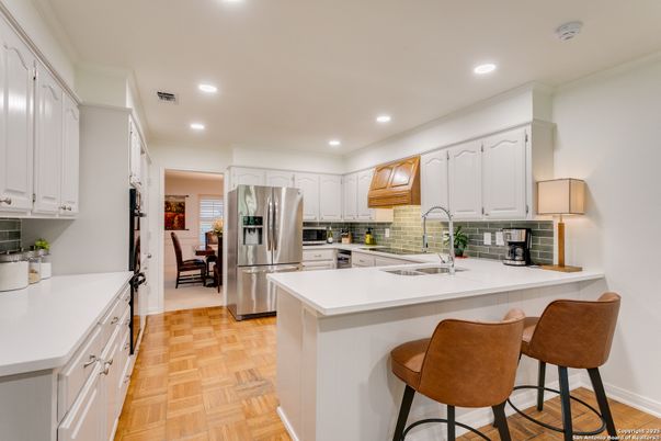 Dining room, Interior, Kitchen, Recessed Lighting, Stainless Steel Appliances, Wood Texture Flooring