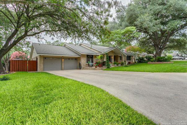Attached, Backyard, Exterior, Facade, Brick Facade, Ranch