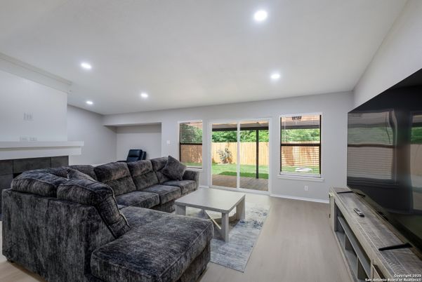 Fireplace, Interior, Living room, Recessed Lighting, Wood Texture Flooring