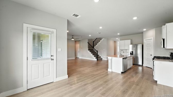 Interior, Kitchen, Recessed Lighting, Stainless Steel Appliances, Wood Texture Flooring