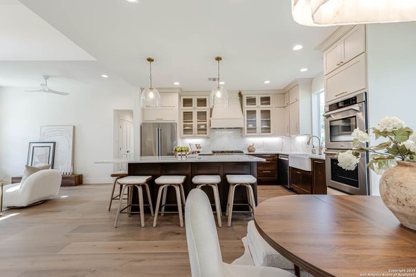 Dining room, Interior, Kitchen, Pendant Lights, Recessed Lighting, Stainless Steel Appliances, Wood Texture Flooring