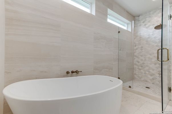 Bathroom, Free Standing Baths, Glass Shower, Interior, Marble Walls, Recessed Lighting