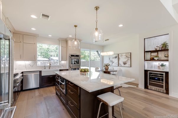 Dining room, Interior, Kitchen, Pendant Lights, Recessed Lighting, Stainless Steel Appliances, Wood Texture Flooring