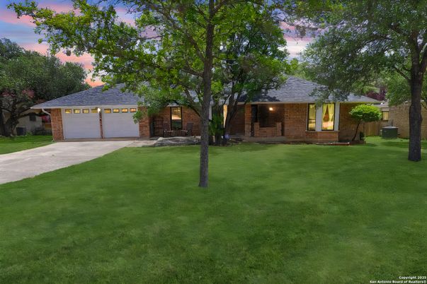 Attached, Backyard, Exterior, Facade, Brick Facade, Ranch
