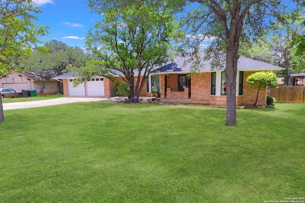 Attached, Backyard, Exterior, Facade, Brick Facade, Ranch