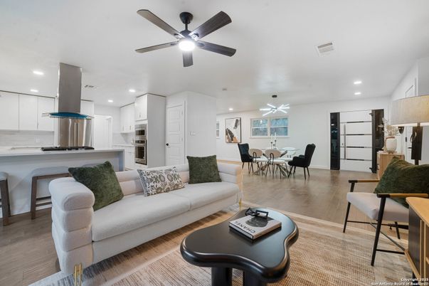 Dining room, Interior, Kitchen, Living room, Recessed Lighting, Stainless Steel Appliances, Wood Texture Flooring