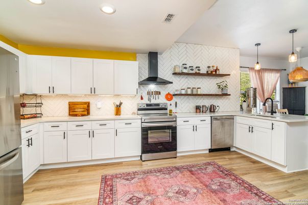 Interior, Kitchen, Pendant Lights, Recessed Lighting, Stainless Steel Appliances, Wood Texture Flooring