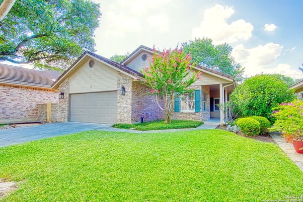 Attached, Backyard, Exterior, Facade, Brick Facade, Ranch