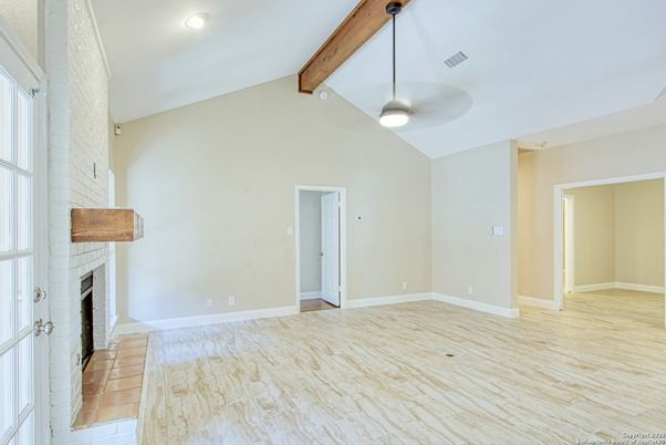 Empty room, Fireplace, Interior, Recessed Lighting, Wooden Beams, Wood Texture Flooring