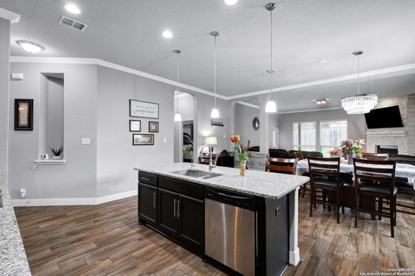 Chandelier, Dining room, Fireplace, Interior, Kitchen, Pendant Lights, Recessed Lighting, Wood Texture Flooring