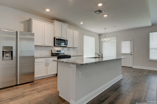 Chandelier, Interior, Kitchen, Recessed Lighting, Stainless Steel Appliances, Wood Texture Flooring