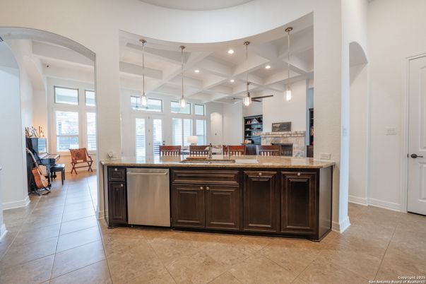 Dining room, Fireplace, Interior, Kitchen, Pendant Lights, Recessed Lighting, Stainless Steel Appliances