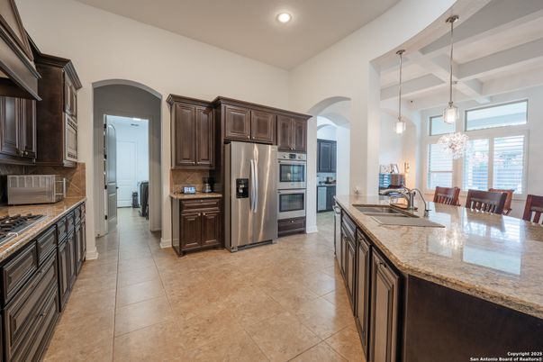 Chandelier, Dining room, Interior, Kitchen, Pendant Lights, Recessed Lighting, Stainless Steel Appliances