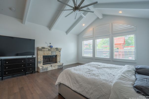 Bedroom, Fireplace, Interior, Recessed Lighting, Wood Texture Flooring