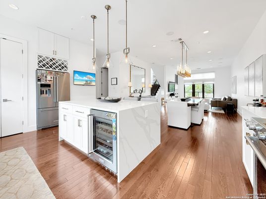 Dining room, Interior, Kitchen, Living room, Pendant Lights, Recessed Lighting, Stainless Steel Appliances, Wood Texture Flooring