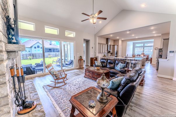 Fireplace, Interior, Kitchen, Living room, Recessed Lighting, Stone Walls, Wood Texture Flooring