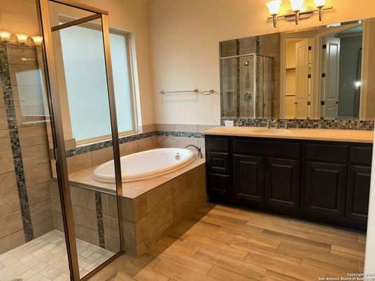 Bathroom, Dual Sink Vanities, Glass Shower, Interior, Wood Texture Flooring