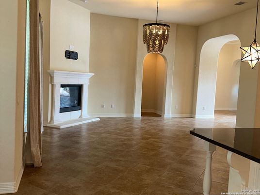 Chandelier, Empty room, Fireplace, Interior